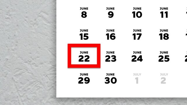 The date June 22nd marked with a red cursor on the wall calendar 2026