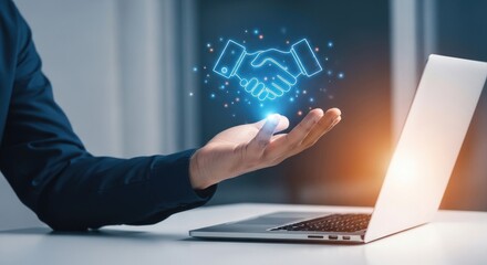 Obraz premium Business partnership and technology concept with hand and holographic shaking hands