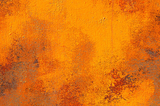 Abstract Vibrant Orange Rusty Metal Texture with Grunge Corrosion