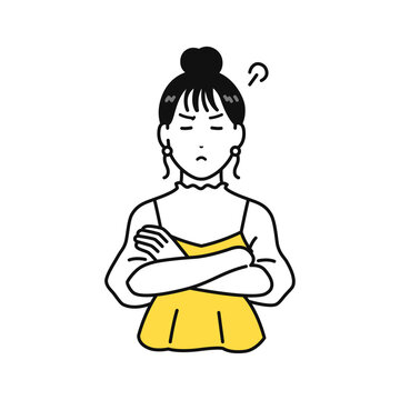 腕組み 怒る 不満 ムカつく まとめ髪の若い女性