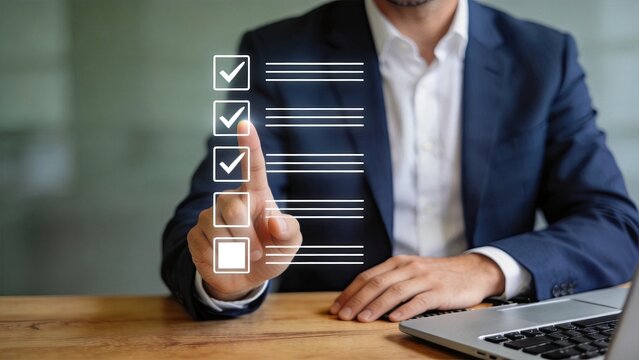 Business executive checking off items on a virtual checklist list, project management and task completion concept