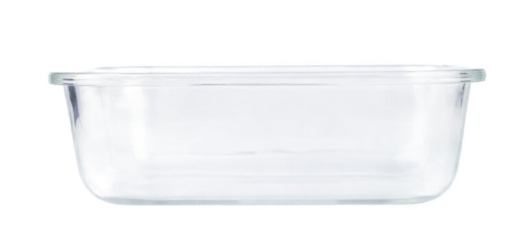 Empty glass baking dish on transparent background. Rectangular cookware for oven use. Transparent kitchen container for food preparation, roasting, and cooking dinner in household kitchen.