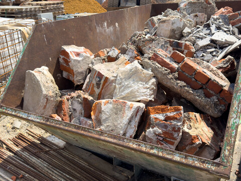construction site with Container with brick rubble