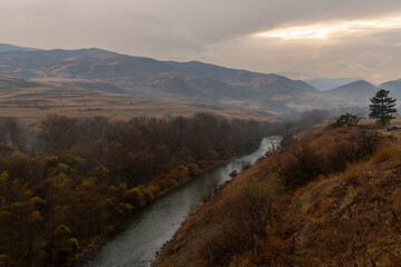 Autumn landscape of river in the Caucasus mountains of Georgia © Pavel