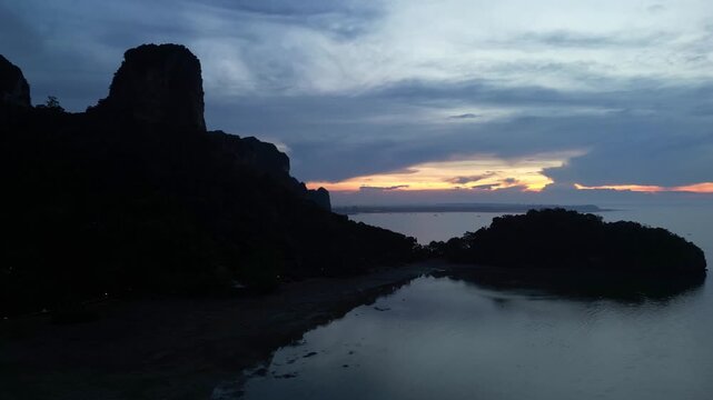 Krabi, Thailand : Aerial drone footage of beautiful sunrise on Railay east h side in coastline of Krabi, Thailand surrounded by limestone cliff