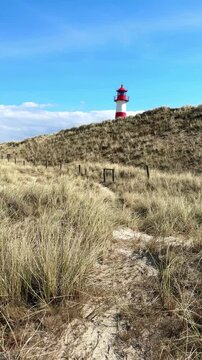 the red and white famous lighthouse on the island Sylt