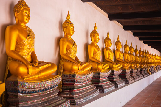Several Buddha statues lined up in a row at Wat Phutthaisawan are a symbol of this temple.