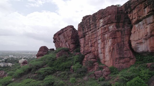 Aerial view of Badami Caves with rugged cliffs and scenic rocky terrain surroundings