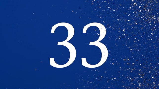 Gold Glitter Blow‑Away Reveal of Number 33 on Solid Background
