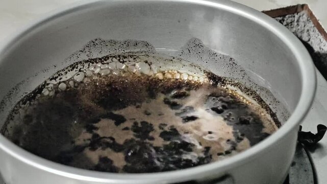 Coffee brewed and heated on the stove