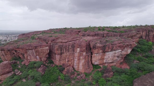 Top view of Badami Caves with rocky formations and natural terrain under open sky