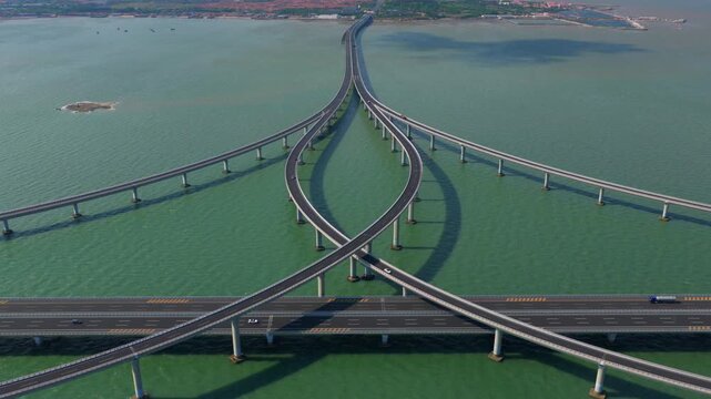 Qingdao cross-sea bridge drone footage, coastal expressway China &middot; Long sea bridge stretching over Jiaozhou Bay, China infrastructure aerial