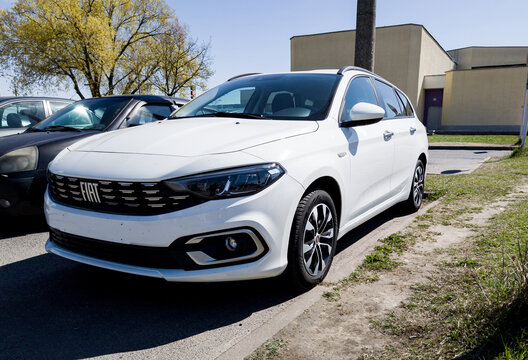 - Front view of a white Fiat Tipo SW.