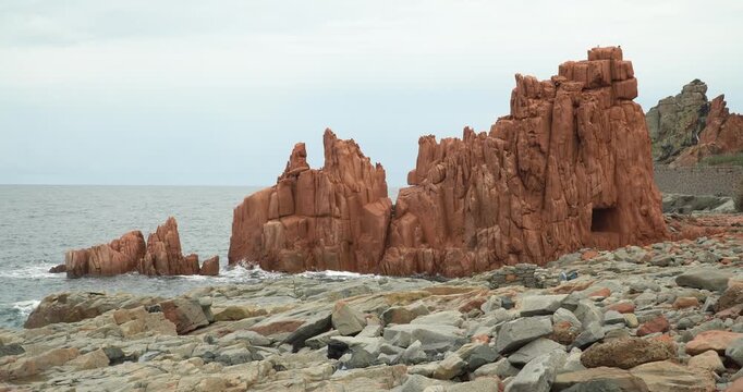 Rocce Rosse red porphyry rock formations in Arbatax, Sardinia, Italy
