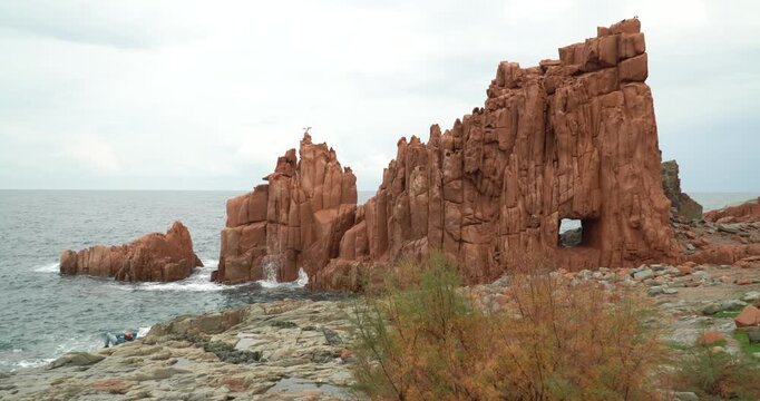 Rocce Rosse red porphyry rock formations in Arbatax, Sardinia, Italy