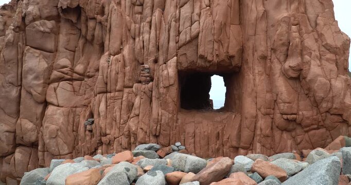 Rocce Rosse red porphyry rock formations in Arbatax, Sardinia, Italy