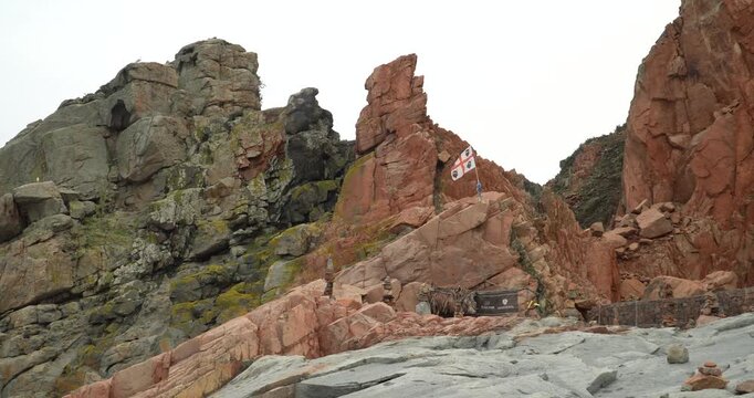 Rocce Rosse red porphyry rock formations in Arbatax, Sardinia, Italy
