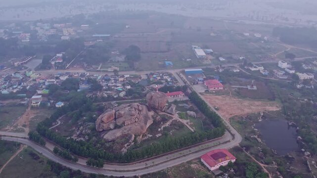 Bird eye view of Eagle sculpture or Jatayu Garuda statue with outstretched wings on top of big rock