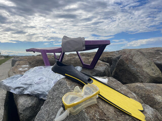 flippers and mask for diving on the beach. © artmim