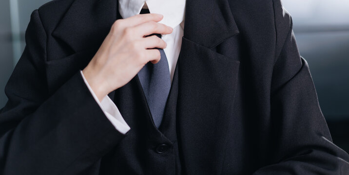 Businesswoman adjusting tie closeup for corporate portrait and professional presentation banner background