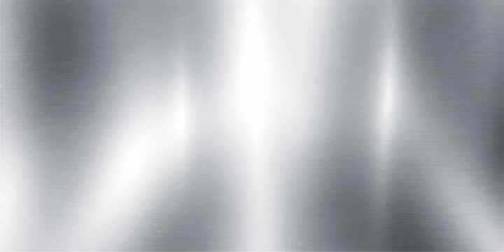 A polished silver brushed metal texture background with a shiny metallic stainless steel surface pattern and gray chrome reflections on a light aluminium plate backdrop