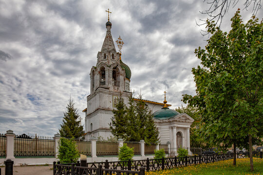 White church with golden dome stands tall