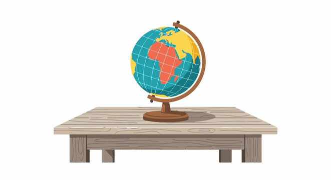 A colorful globe rests on a wooden tabletop with shadow
