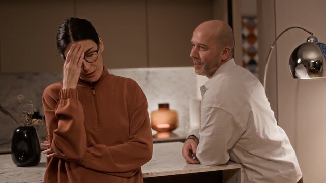 Slow motion of tired spouses trying to get along with each other while discussing upcoming divorce