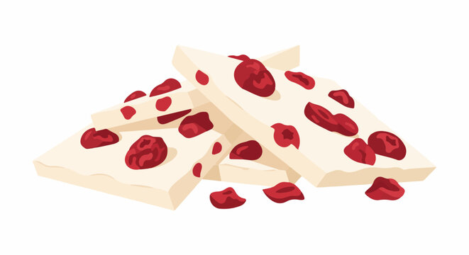A pile of white chocolate bars with embedded dried cranberries