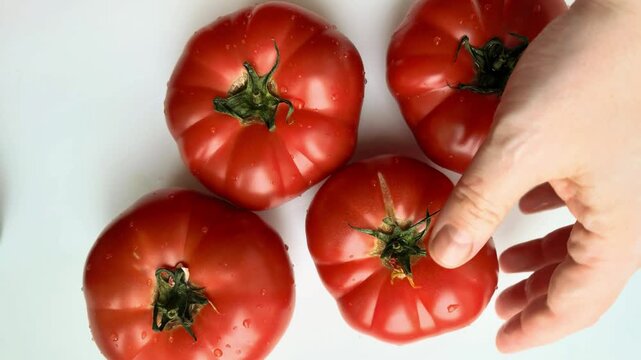 Fresh organic tomatoes in flat lay composition, healthy natural food and farm produce concept.