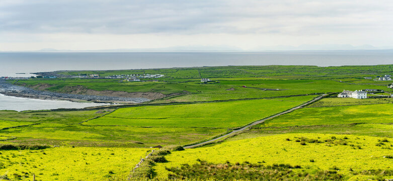 Coastal landscape near Doonagore Castle and Doolin, County Clare, Ireland. Scenic Atlantic farmland on the Wild Atlantic Way with views toward the Aran Islands.