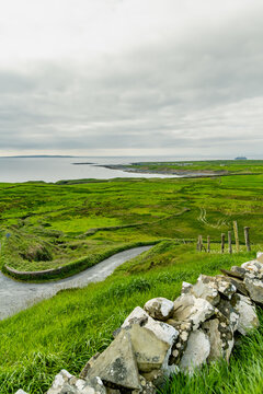 Coastal landscape near Doonagore Castle and Doolin, County Clare, Ireland. Scenic Atlantic farmland on the Wild Atlantic Way with views toward the Aran Islands.