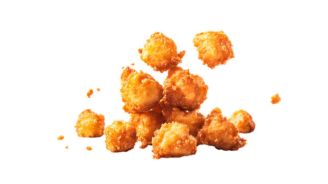 Fried chicken pop-corn scattered in air