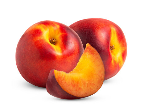 Red nectarine fruit and cut in a slice of red nectarine peach isolated.