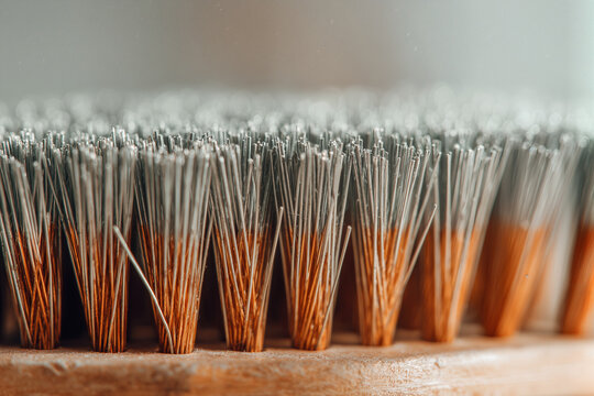 DIY Projects Close-Up of Wire Brush Bristles on Wooden Handle for Home