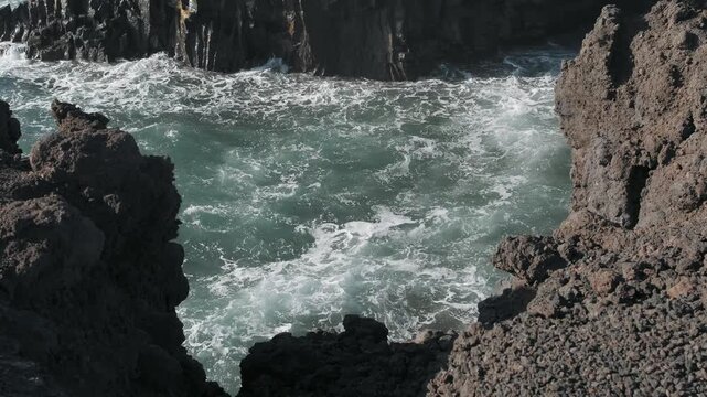 waves crashing on rocks