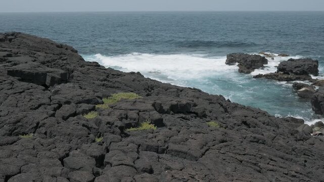 waves crashing on rocks