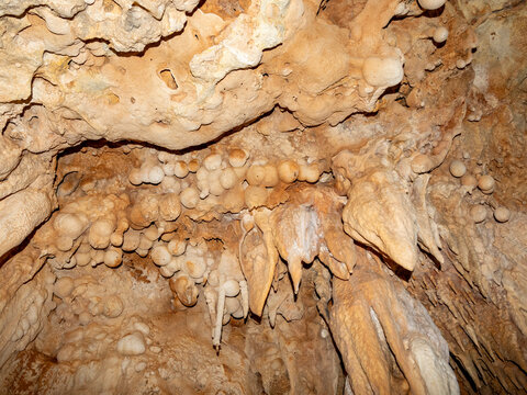Discovering flowstone and cave formations in Sakalavas cave of Anjajavy Private Reserve in Madagascar
