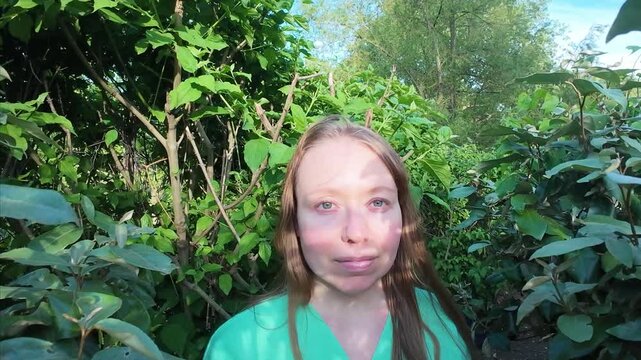 Woman in green nature mental health happiness concept