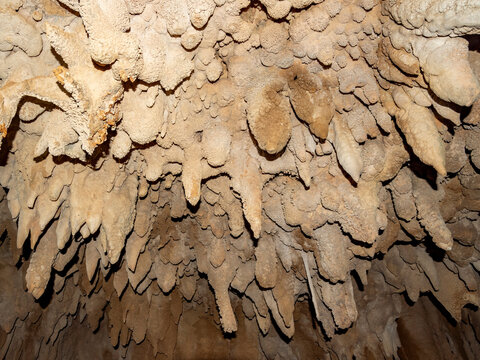 Exploring unique flowstone and cave formations in Sakalavas cave within Anjajavy Private Reserve in Madagascar