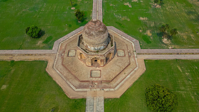 Exploring the historical site of the Tomb of Asif Khan in Lahore, Pakistan with its distinctive dome and surroundings