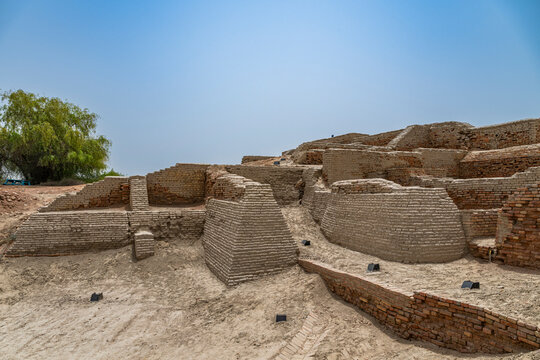 Exploring ancient ruins of Moenjodaro in Pakistan that reflect early urban civilization and architectural innovation