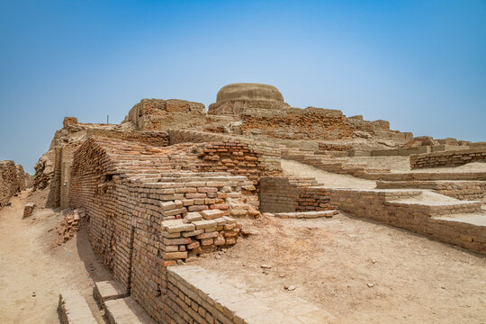 Ruins of ancient structures at Moenjodaro showcase the historical significance of this UNESCO site in Pakistan