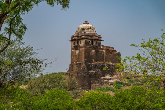 Rohtas Fort stands tall among green trees in Punjab, showcasing its historical structure and cultural significance in Pakistan
