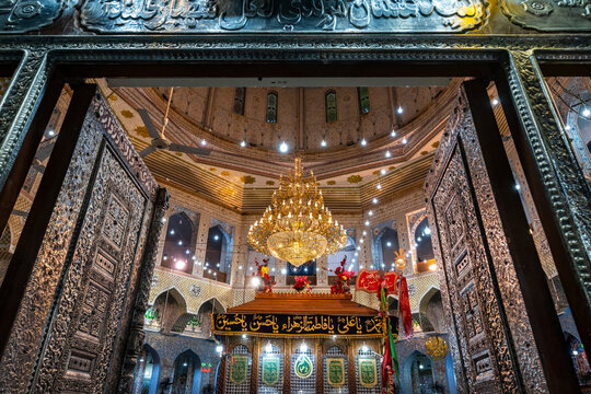 Exploring the intricate architecture and design of the Shrine of Lal Shahbaz Qalandar in Sehwan, Pakistan with vibrant decorations and lights