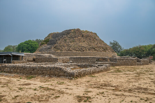 Explore Dharmarajika Stupa in Taxila, a site of historical significance in Punjab, Pakistan with ancient ruins and cultural value
