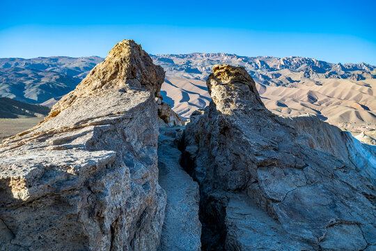 Explore the Valley of the Dragon with its rocky formations and vast sandy landscapes in Afghanistan