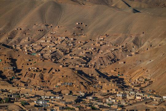 View over mountains and village in Bamyian with historical significance from Shahr-e-Gholghola in Afghanistan