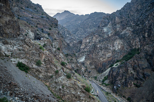 Highway winding through rocky terrain in Mahipar pass area of Afghanistan&rsquo;s mountain landscape