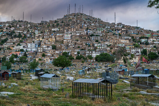 Cemetery surrounding the Blue mosque and Sakhi Shah-e Mardan Shrine in Kabul, Afghanistan near residential areas